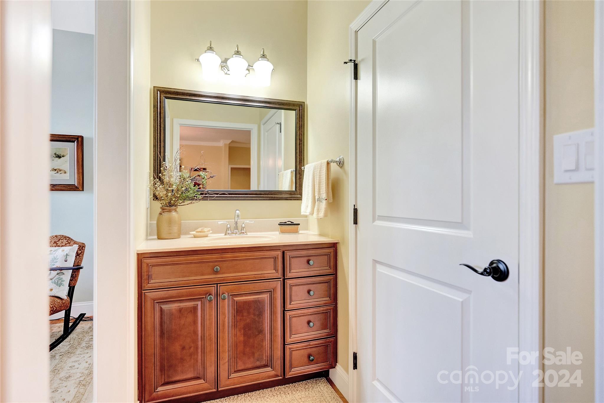 29 Willow Bend Candler, NC 28715 - Photo 28 of 45 a bathroom with a granite countertop sink a mirror and a
