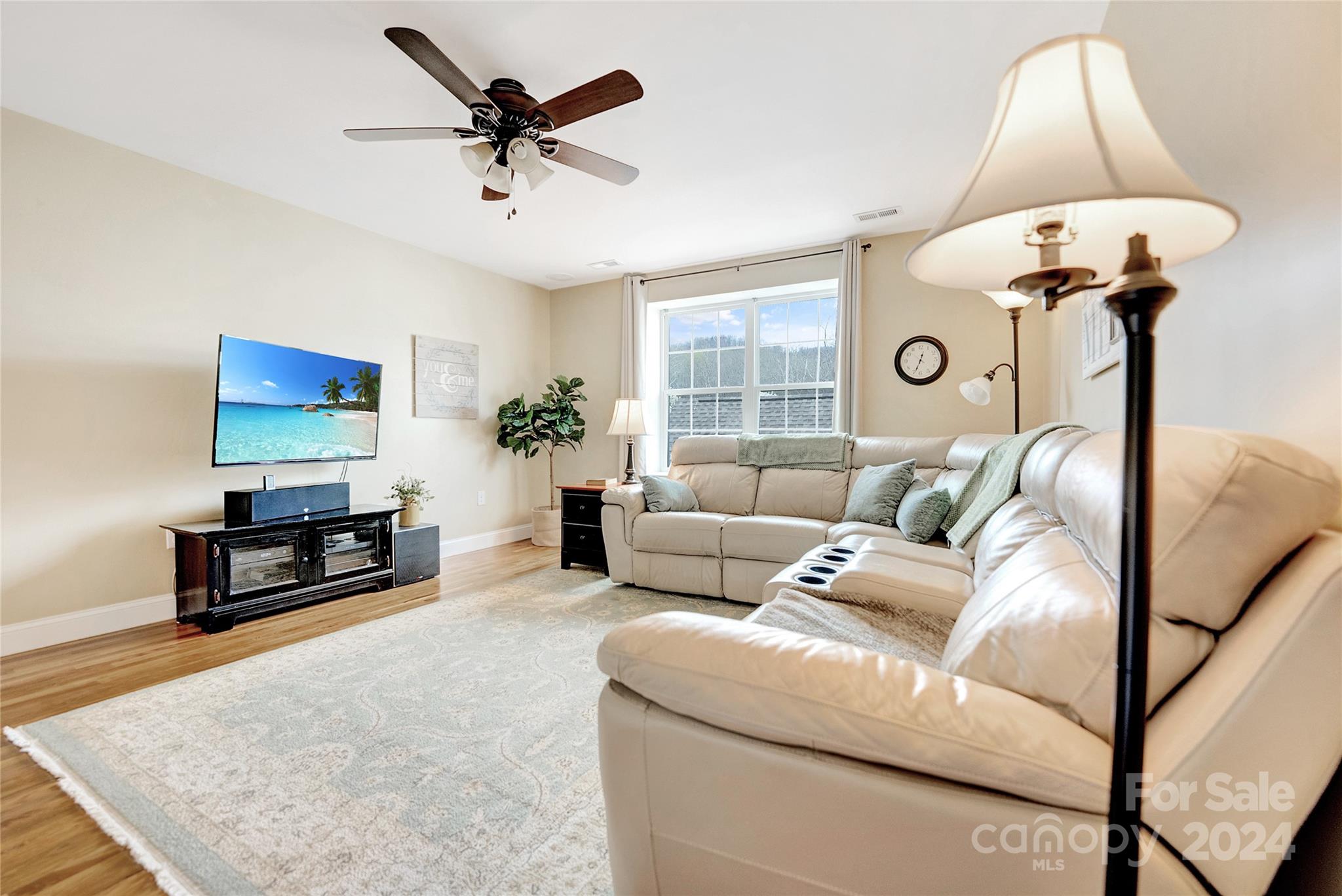 29 Willow Bend Candler, NC 28715 - Photo 38 of 45 a living room with furniture a window and a flat screen tv