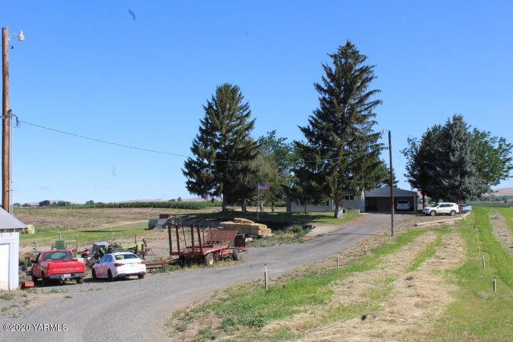 2422 Blaine Road Zillah, WA 98953 - Photo 33 of 39 a car parked on the side of the road