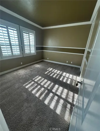 a bathroom with a double vanity sink and mirror