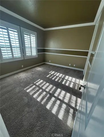 a bathroom with a double vanity sink and mirror