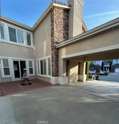 a view of a garden with a patio