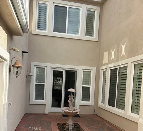 a backyard of a house with seating space