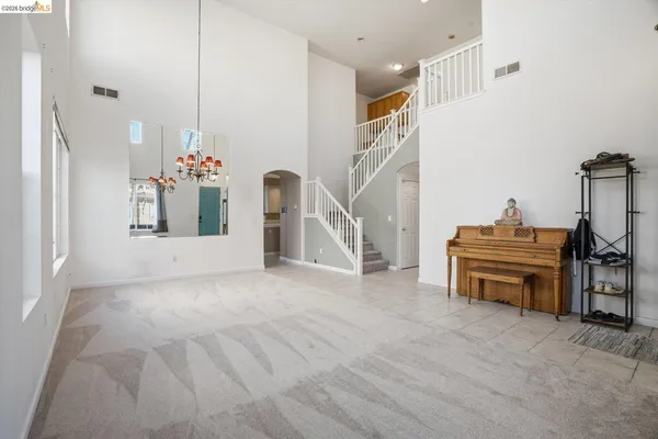 a view of an empty room with stair