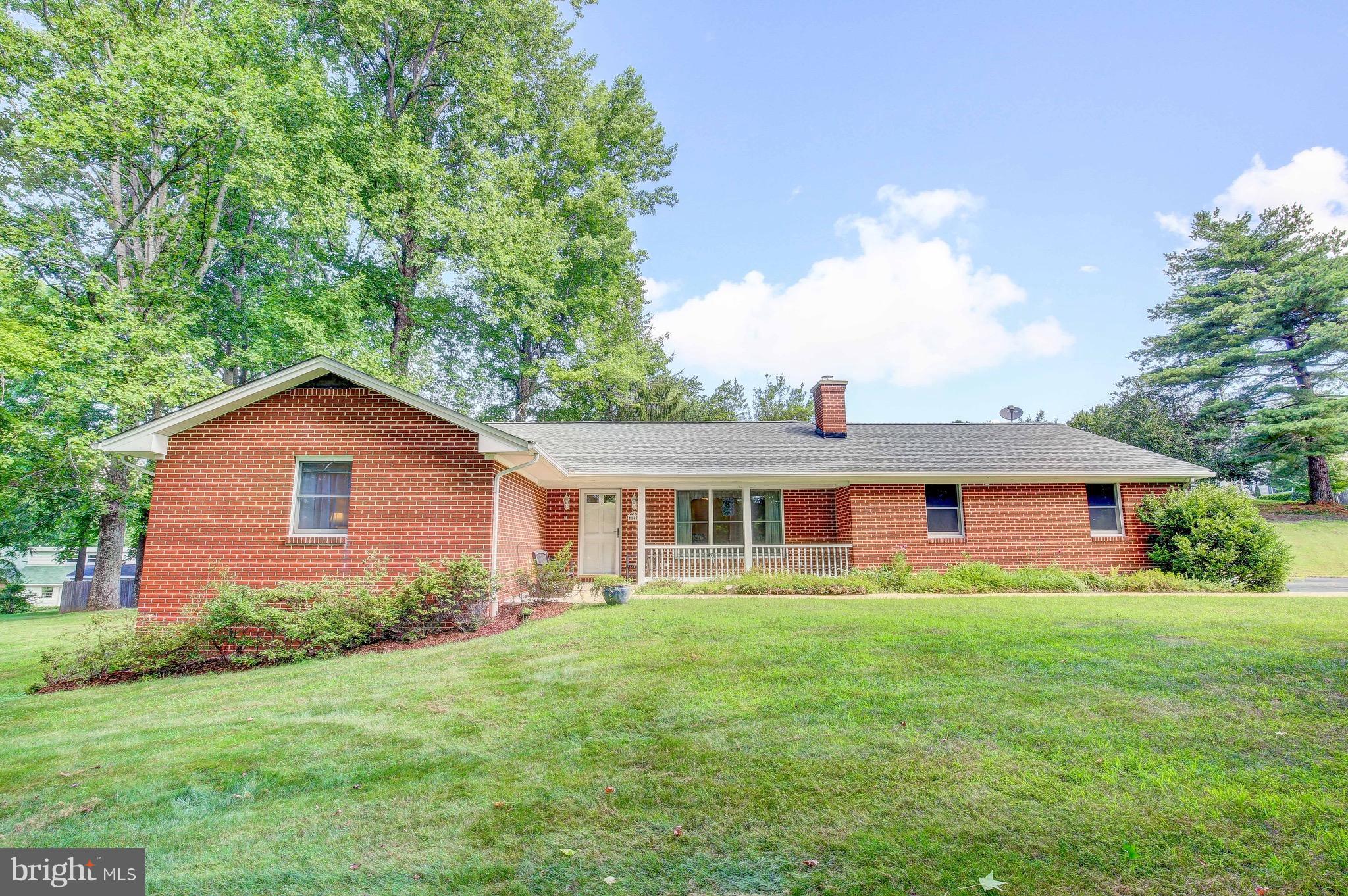 147 Calvert Towne Road Prince Frederick, MD 20678 - Photo 1 of 30 a front view of house with yard and green space