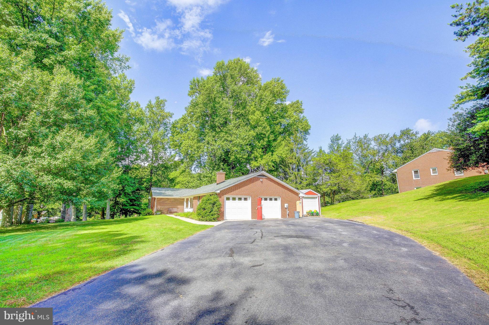 147 Calvert Towne Road Prince Frederick, MD 20678 - Photo 3 of 30 a view of a street with a house in the background