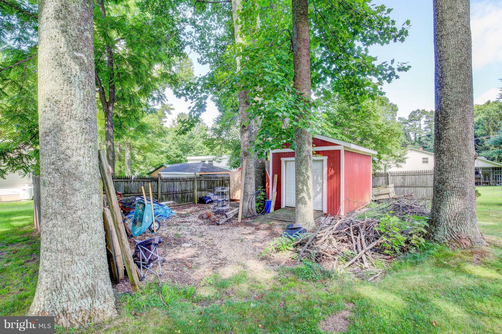 147 Calvert Towne Road Prince Frederick, MD 20678 - Photo 26 of 30 a view of a house with backyard and garden