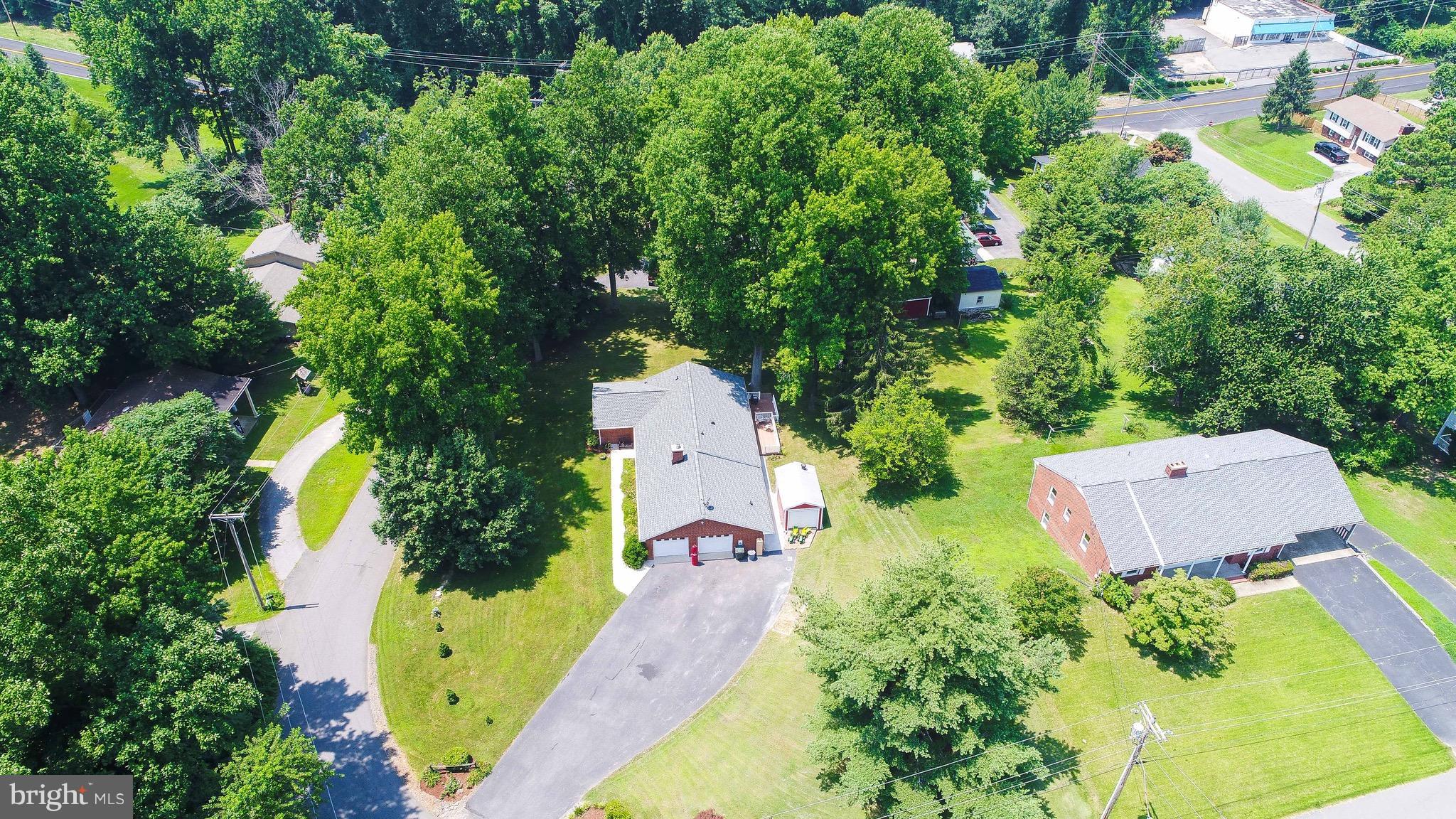 147 Calvert Towne Road Prince Frederick, MD 20678 - Photo 28 of 30 an aerial view of residential house with outdoor space and trees all around