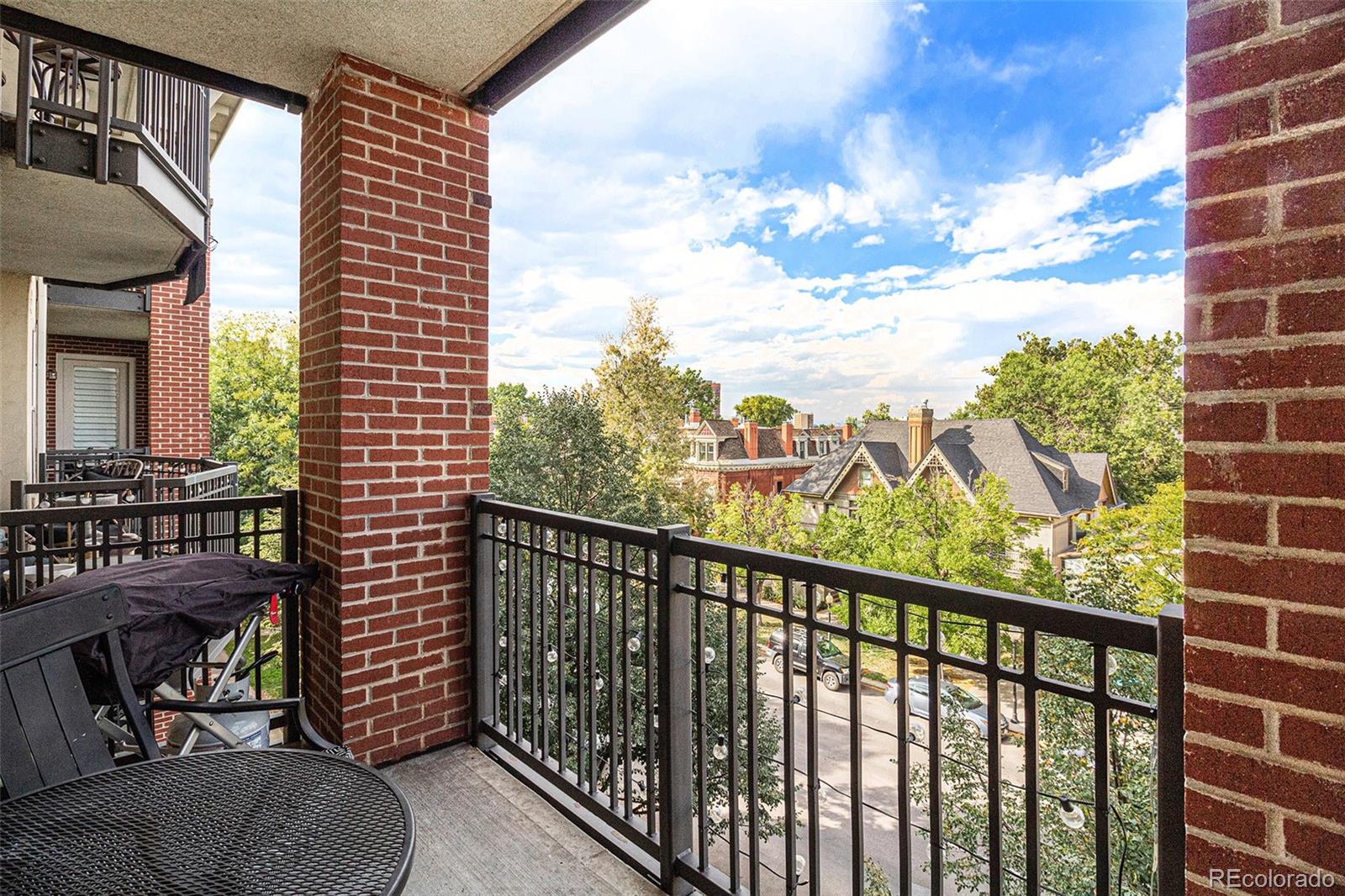 1699 North Downing Street, Unit 302 Denver, CO 80218 - Photo 16 of 23 a view of balcony with furniture