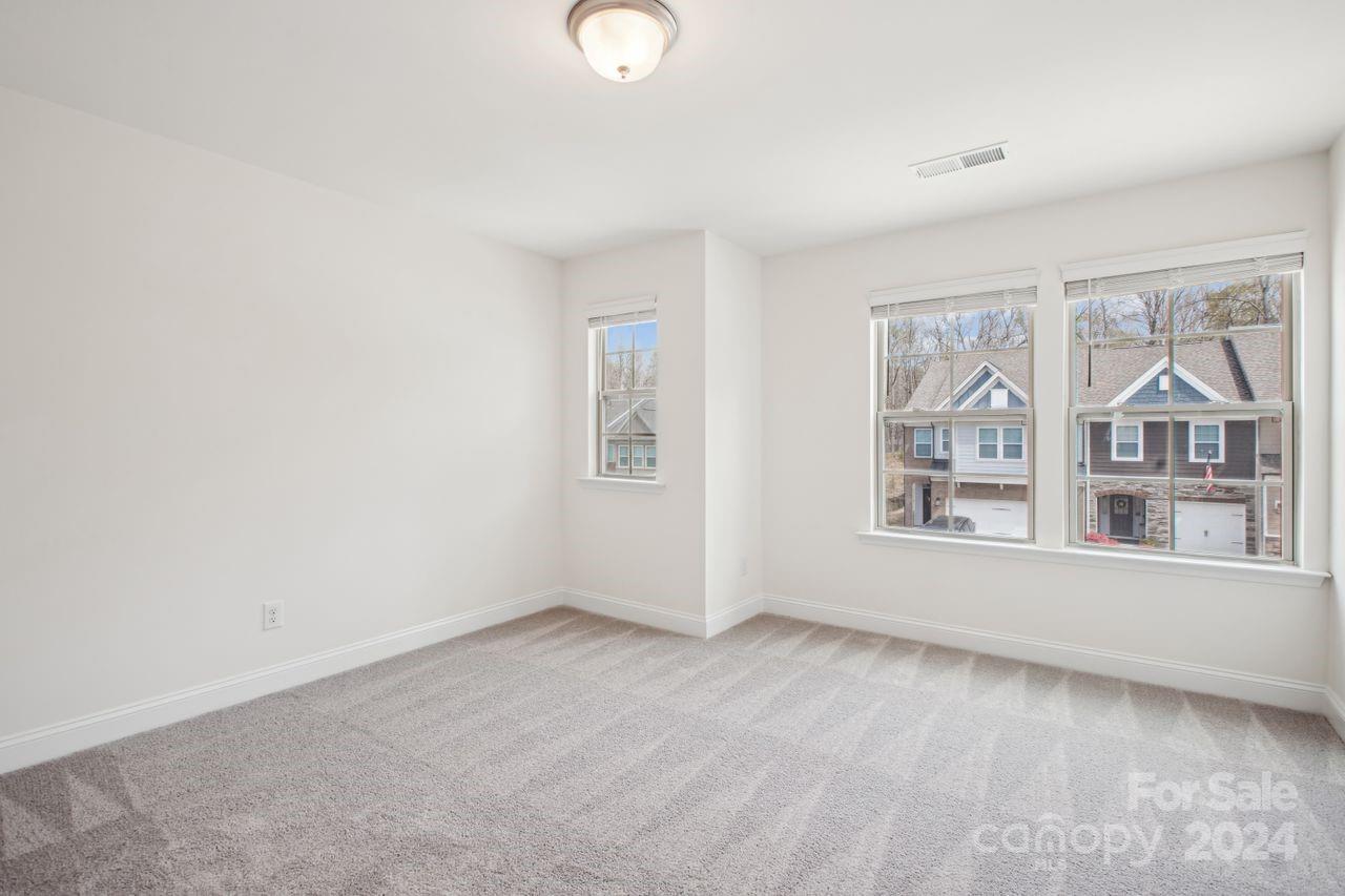 3027 Patchwork Court Fort Mill, SC 29708 - Photo 26 of 33 an empty room with windows