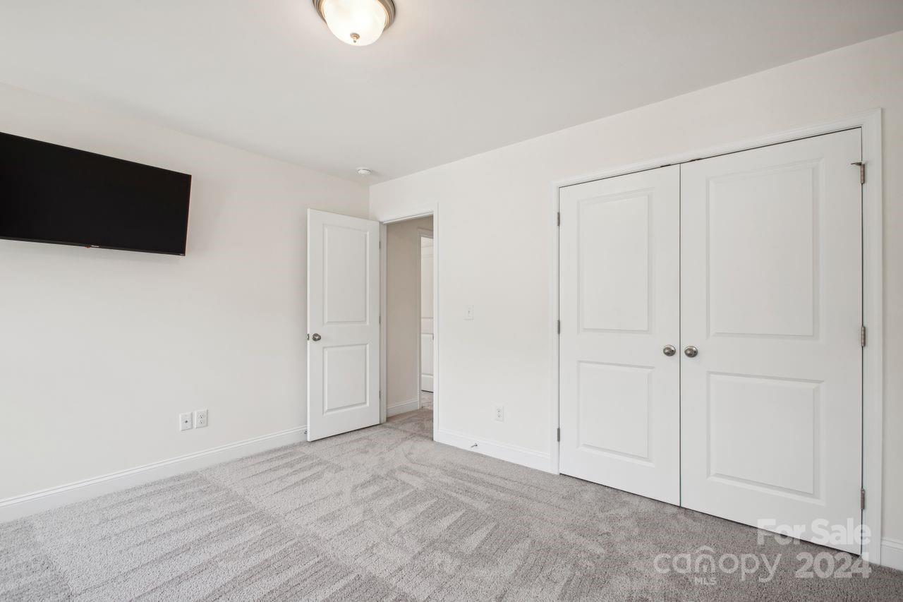 3027 Patchwork Court Fort Mill, SC 29708 - Photo 28 of 33 a view of an empty room with wooden floor
