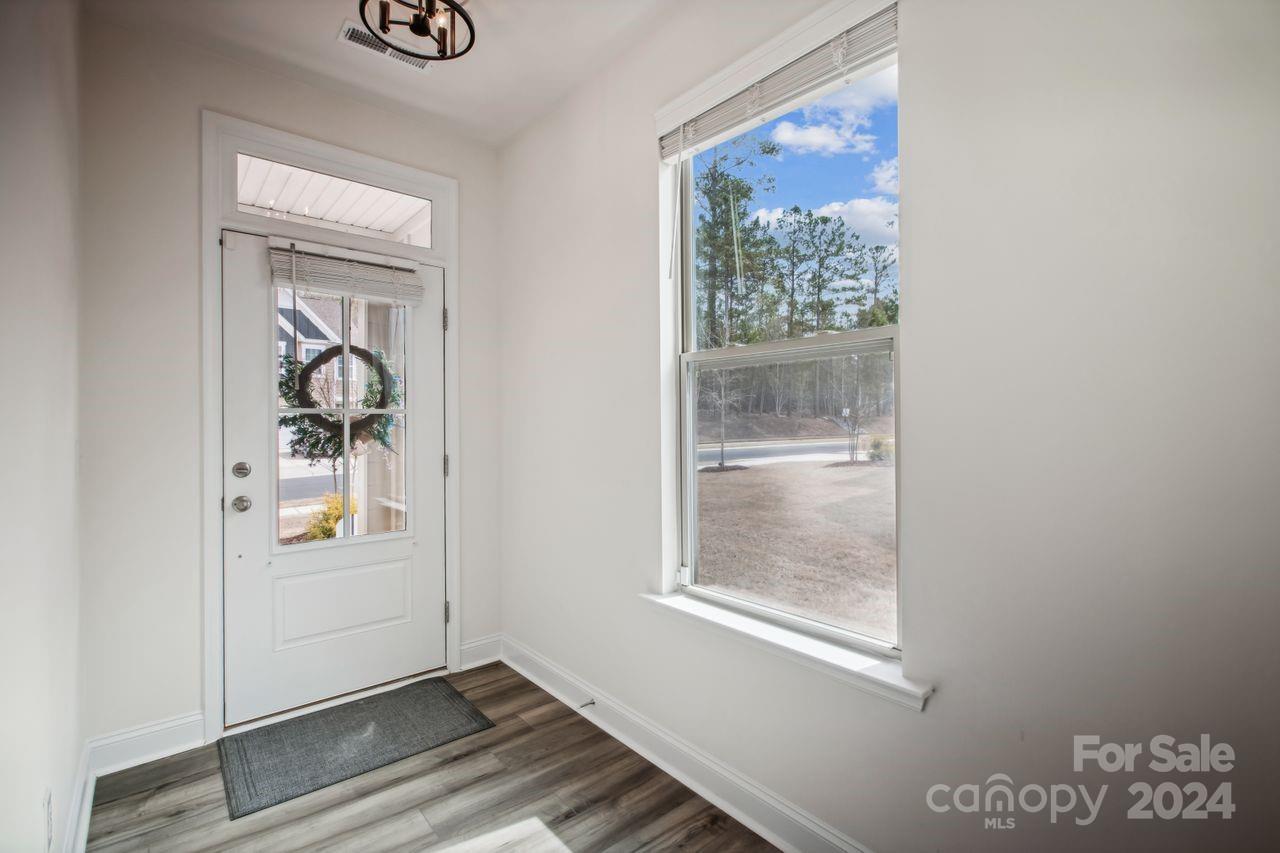 3027 Patchwork Court Fort Mill, SC 29708 - Photo 5 of 33 a view of an entryway with wooden floor