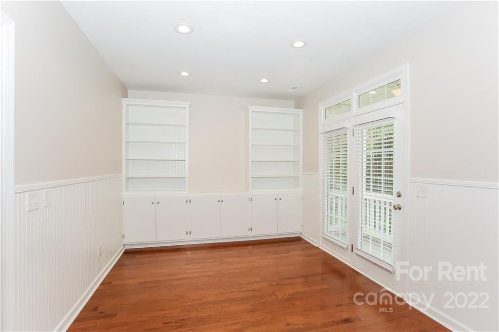 118 West Decatur Avenue Mooresville, NC 28117 - Photo 7 of 17 a view of an empty room with a window
