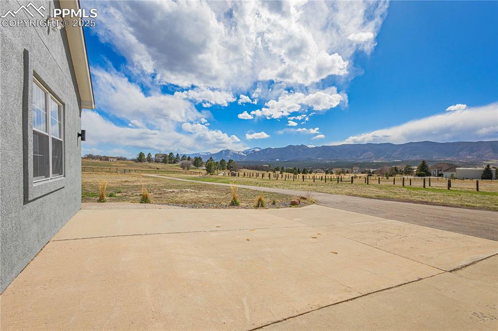 545 Struthers Loop Colorado Springs, CO 80921 - Photo 41 of 48 a view of an ocean with a building in the background