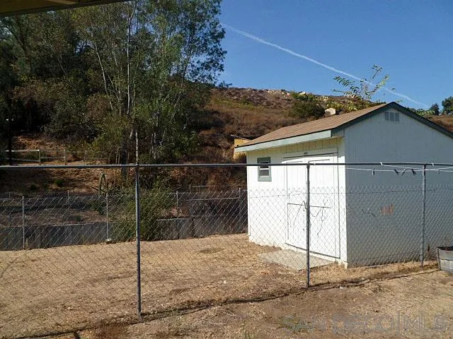 9236 Los Coches Road Lakeside, CA 92040 - Photo 17 of 27 a backyard of a house