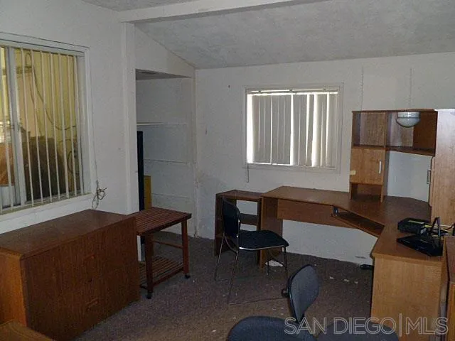 9236 Los Coches Road Lakeside, CA 92040 - Photo 22 of 27 a workspace with furniture and window