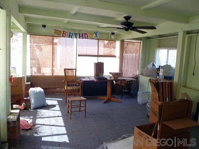 9236 Los Coches Road Lakeside, CA 92040 - Photo 23 of 27 a living room with furniture and a large window