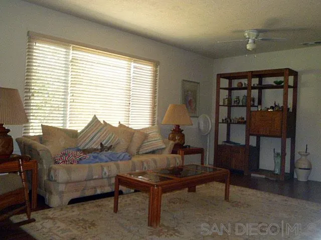 9236 Los Coches Road Lakeside, CA 92040 - Photo 7 of 27 a living room with furniture and a window