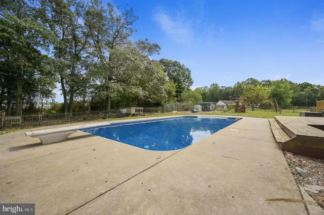 a view of outdoor space and swimming pool