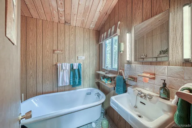 a bedroom with a bed and a cabinets