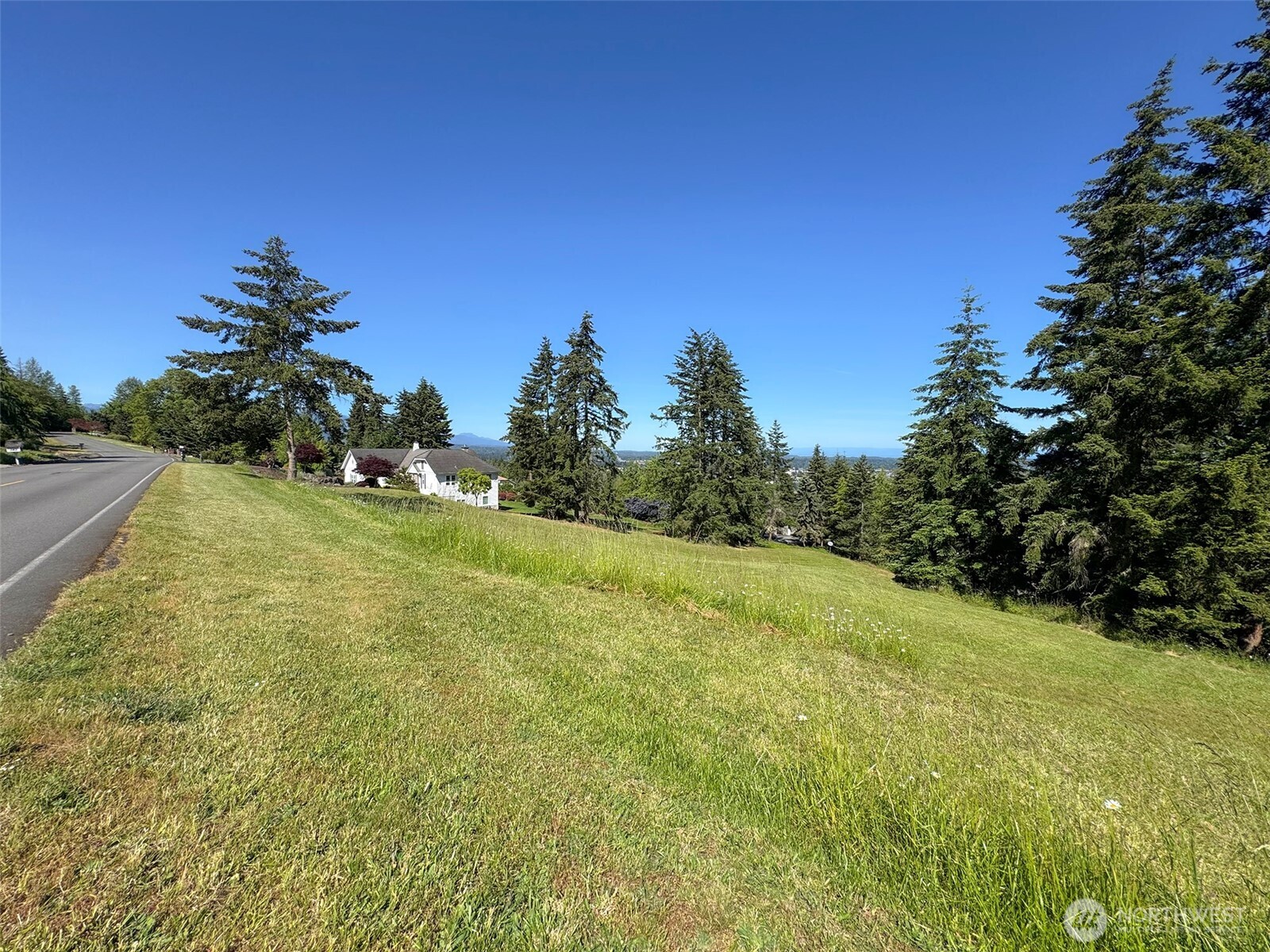 -nka Owls Nest Road Sequim, WA 98382 - Photo 16 of 38 a view of a yard with an outdoor space