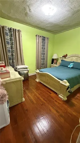 a room with pool table and a window