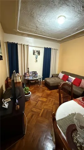 a bedroom with double bed and a window