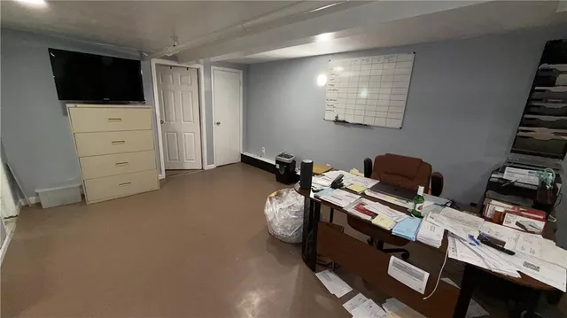 a bathroom with a sink toilet and mirror