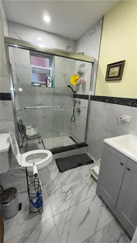 a bathroom with a toilet and a sink