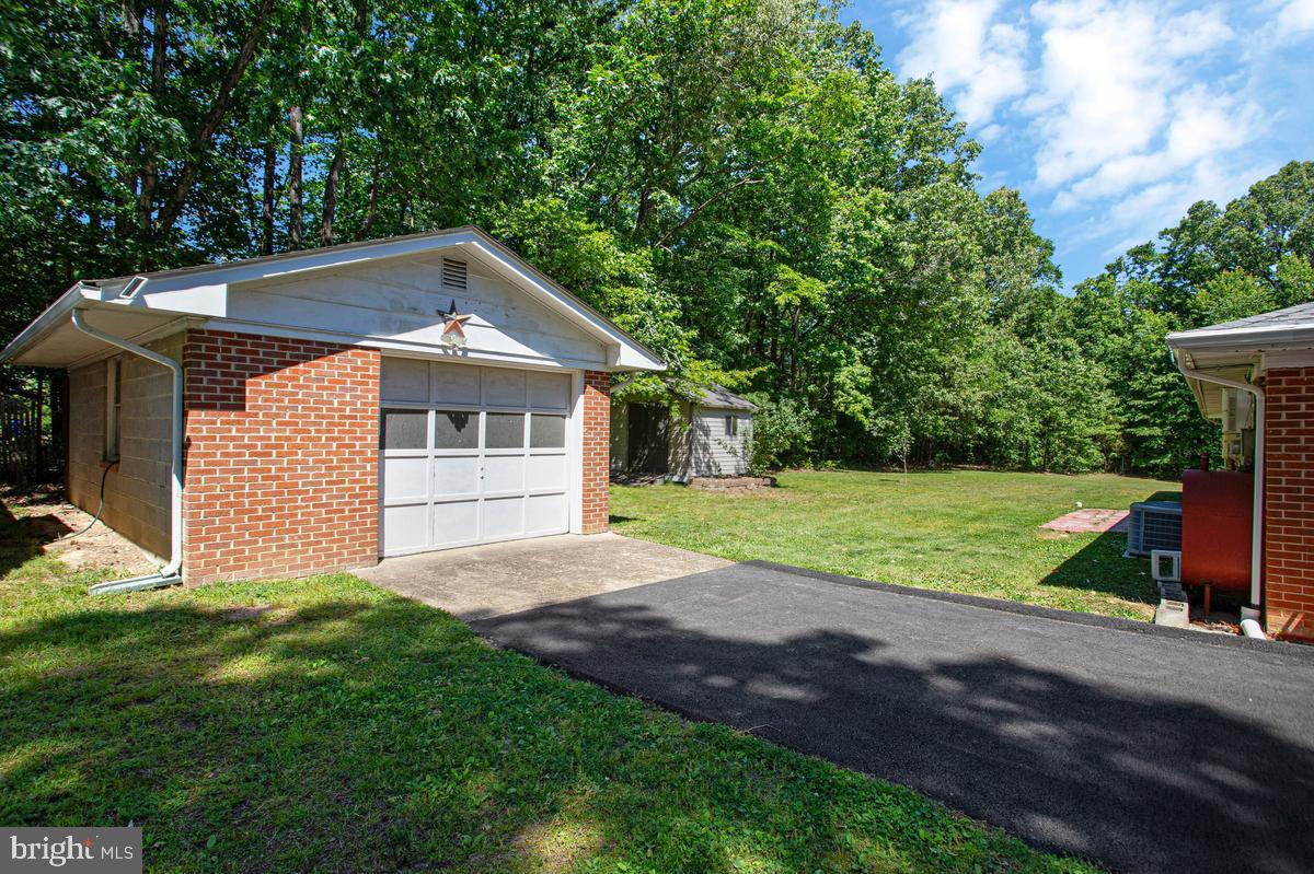 6600 Ashland Road La Plata, MD 20646 - Photo 3 of 40 a front view of a house with yard