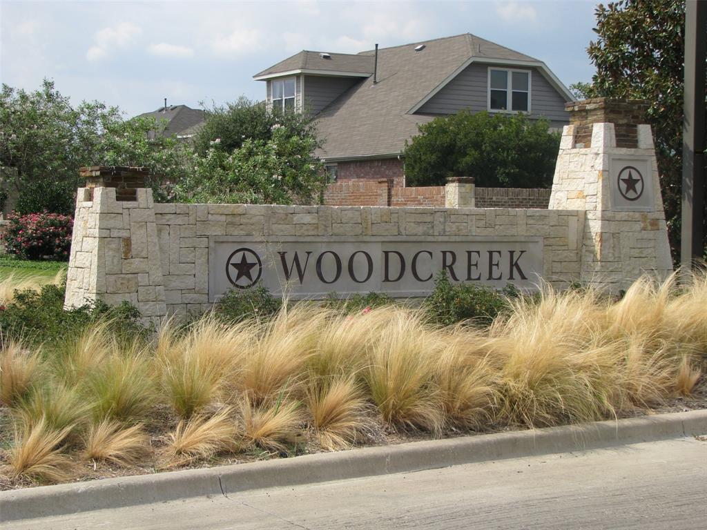426 Plains Place Fate, TX 75087 - Photo 4 of 24 a front view of a house with a yard