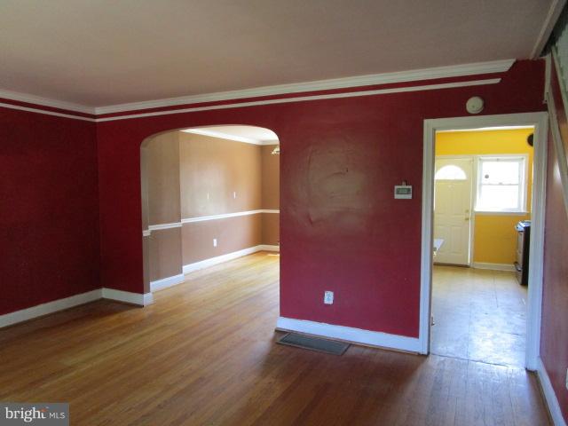 1109 Andover Road Baltimore, MD 21218 - Photo 2 of 16 Living Room with Crown Molding