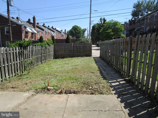 1109 Andover Road Baltimore, MD 21218 - Photo 15 of 16 Fenced Yard with Lawn