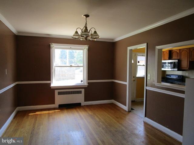1109 Andover Road Baltimore, MD 21218 - Photo 4 of 16 Spacious Dining Room next to Kitchen