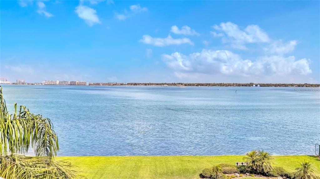 5151 Isla Key Boulevard South, Unit 421 St. Petersburg, FL 33715 - Photo 1 of 1 a view of a swimming pool and an outdoor seating