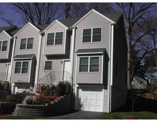 18 Edgemoor Circle, Unit 18 Wellesley, MA 02482 - Photo 1 of 1 a front view of a house with a yard