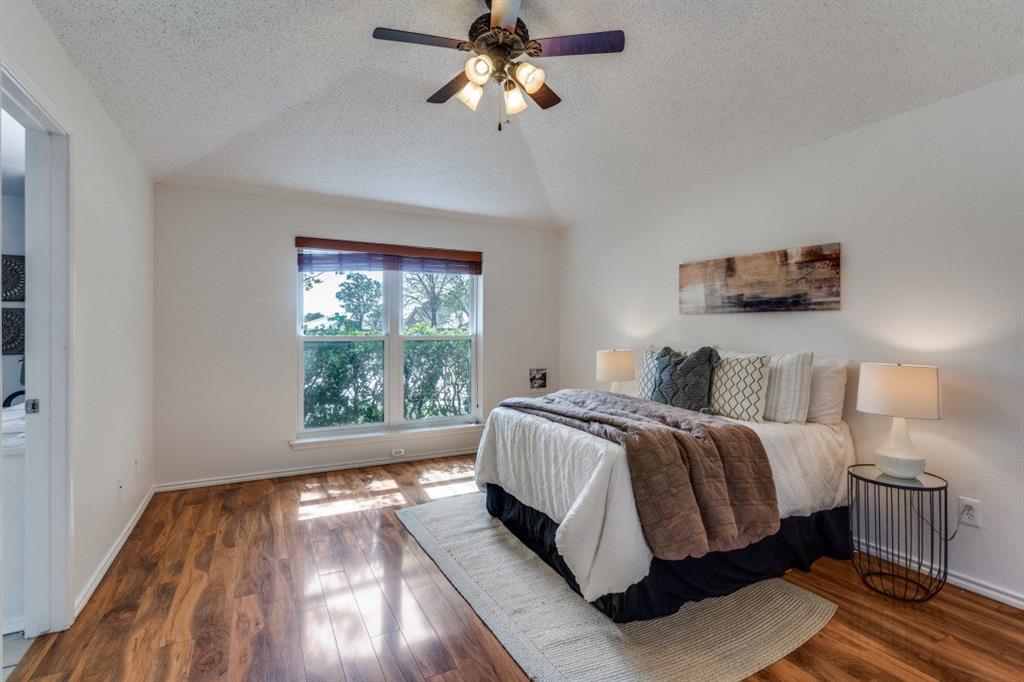 1509 Clover Drive Allen, TX 75002 - Photo 13 of 25 a bed sitting in a bedroom next to a window