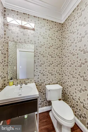 a spacious bathroom with a granite countertop tub sink and mirror