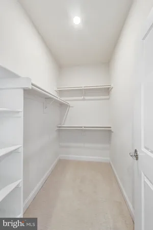 a picture of a bench in a white building
