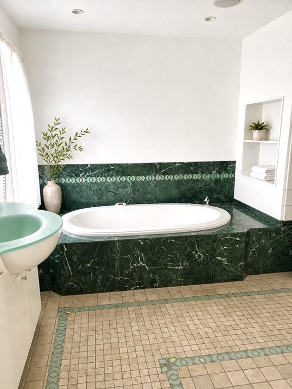 5 Rebecca Road Newton, MA 02465 - Photo 23 of 42 a view of bathroom with a tub and a sink
