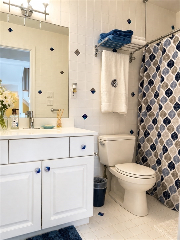 5 Rebecca Road Newton, MA 02465 - Photo 25 of 42 a bathroom with a sink toilet and shower