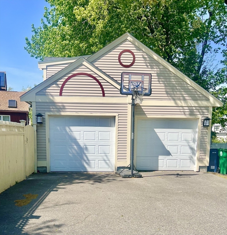 5 Rebecca Road Newton, MA 02465 - Photo 37 of 42 a view of a house with a garage and a garage