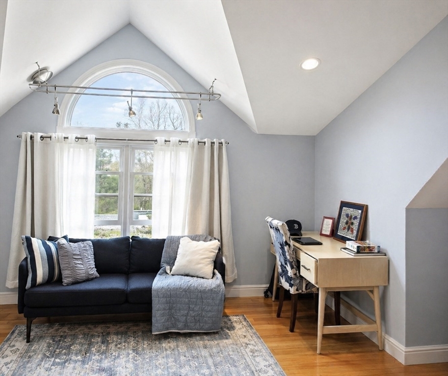 5 Rebecca Road Newton, MA 02465 - Photo 10 of 42 a living room with furniture and a chandelier