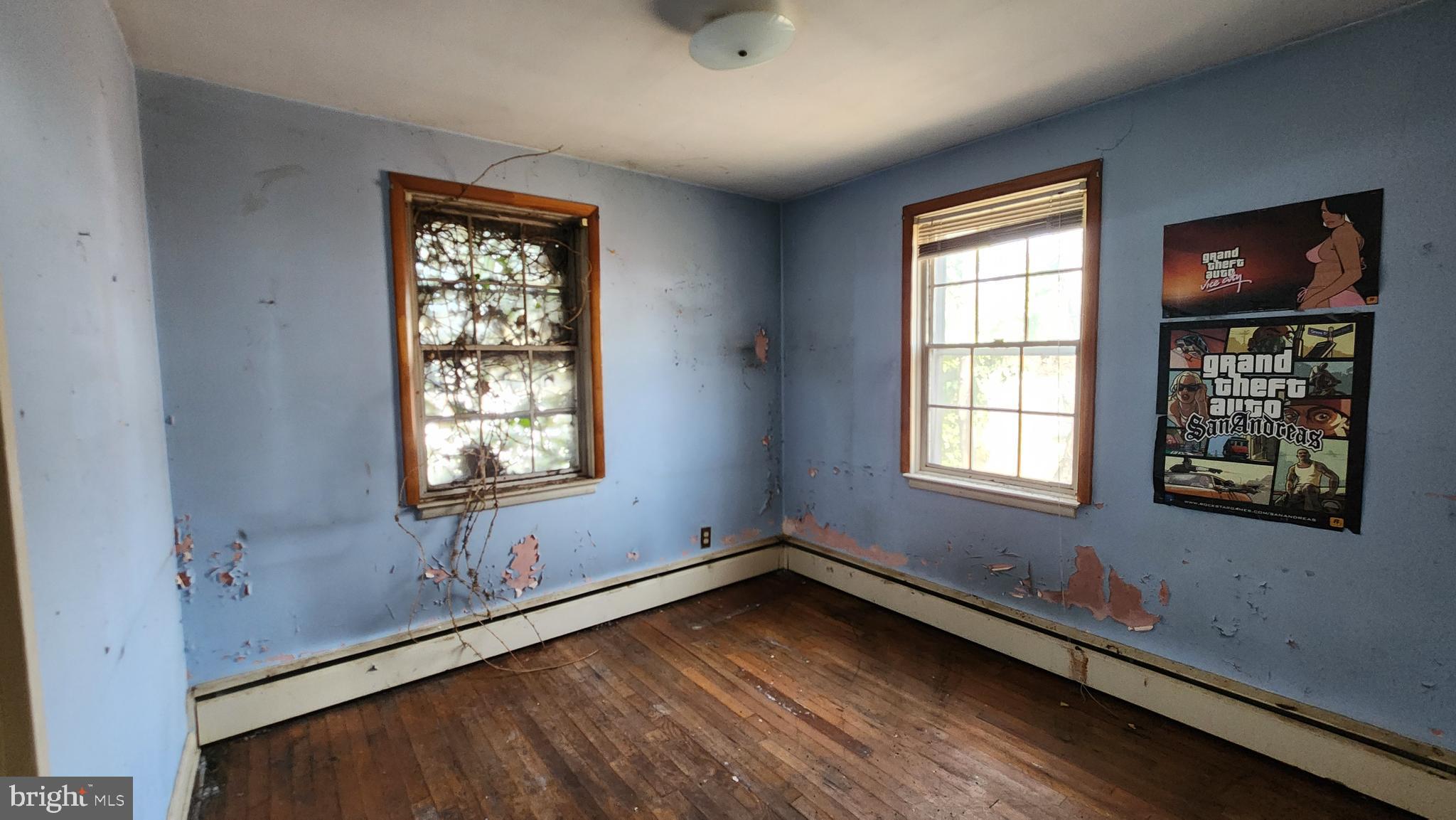 936 Olmstead Road Baltimore, MD 21208 - Photo 14 of 24 a view of an empty room with a window