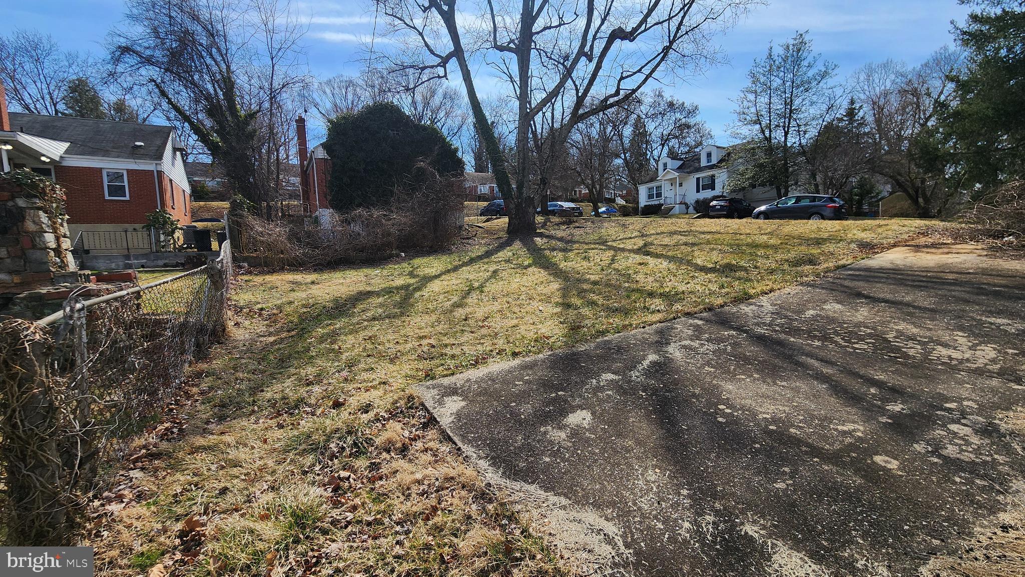 936 Olmstead Road Baltimore, MD 21208 - Photo 4 of 24 a view of a yard with a house