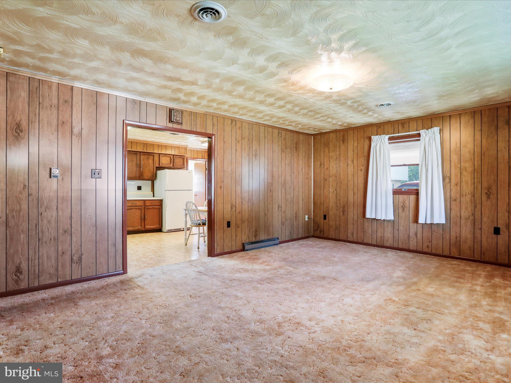 205 South George Street Ranson, WV 25438 - Photo 11 of 31 Living room opens into the kitchen