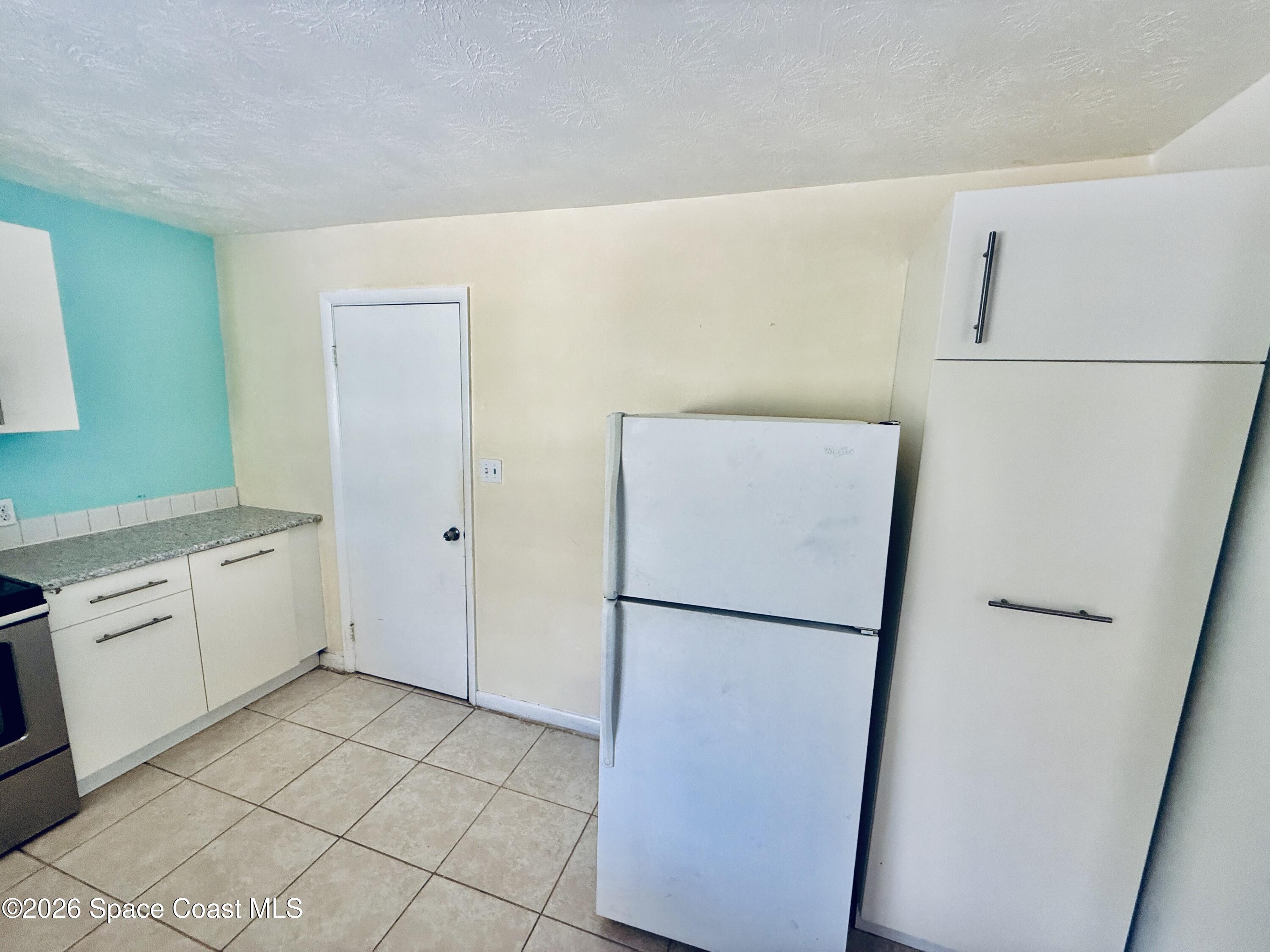 410 South Tropical Trail Merritt Island, FL 32952 - Photo 12 of 28 20260309_161421937_iOS