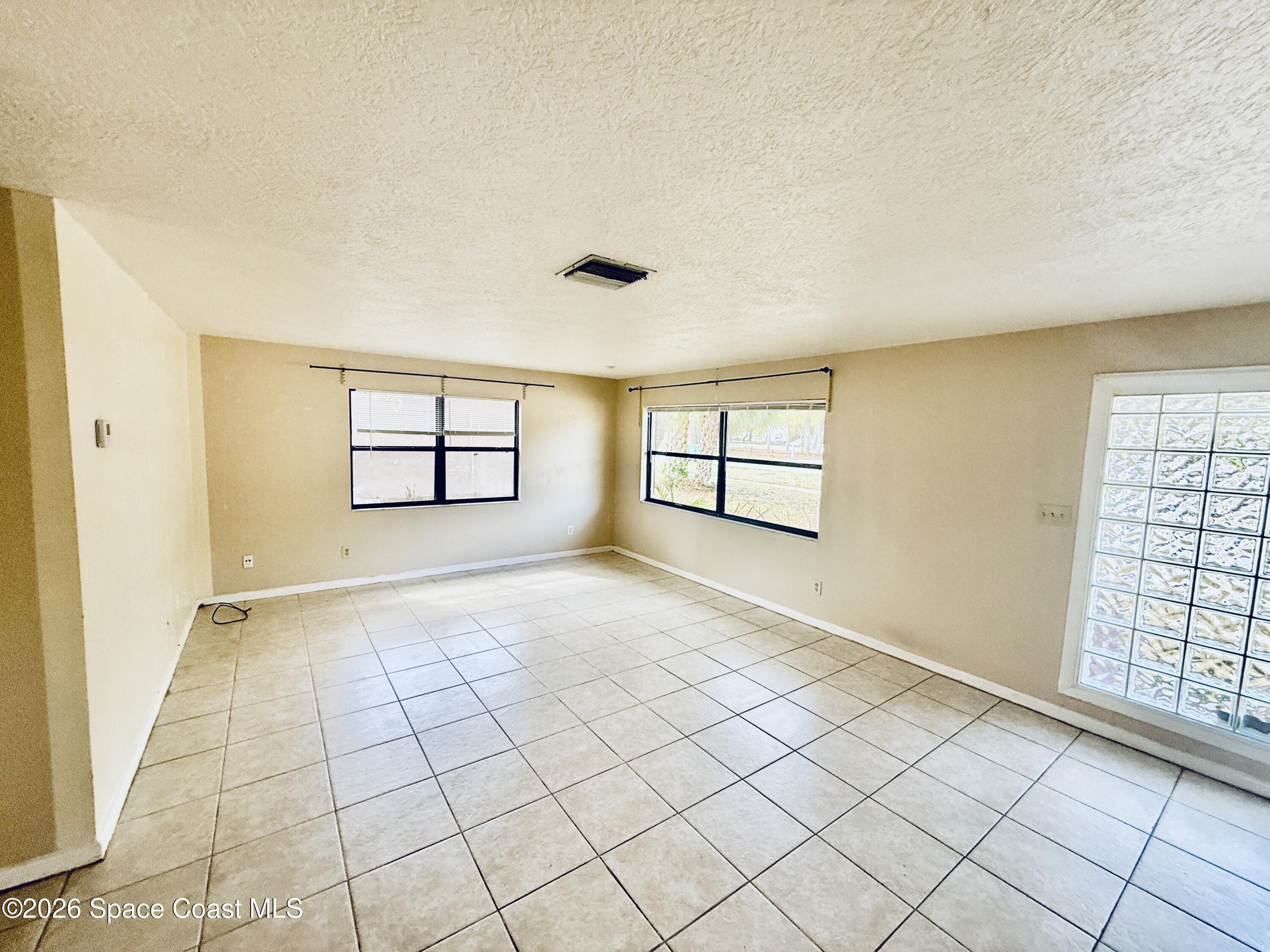 410 South Tropical Trail Merritt Island, FL 32952 - Photo 13 of 28 20260309_161429237_iOS