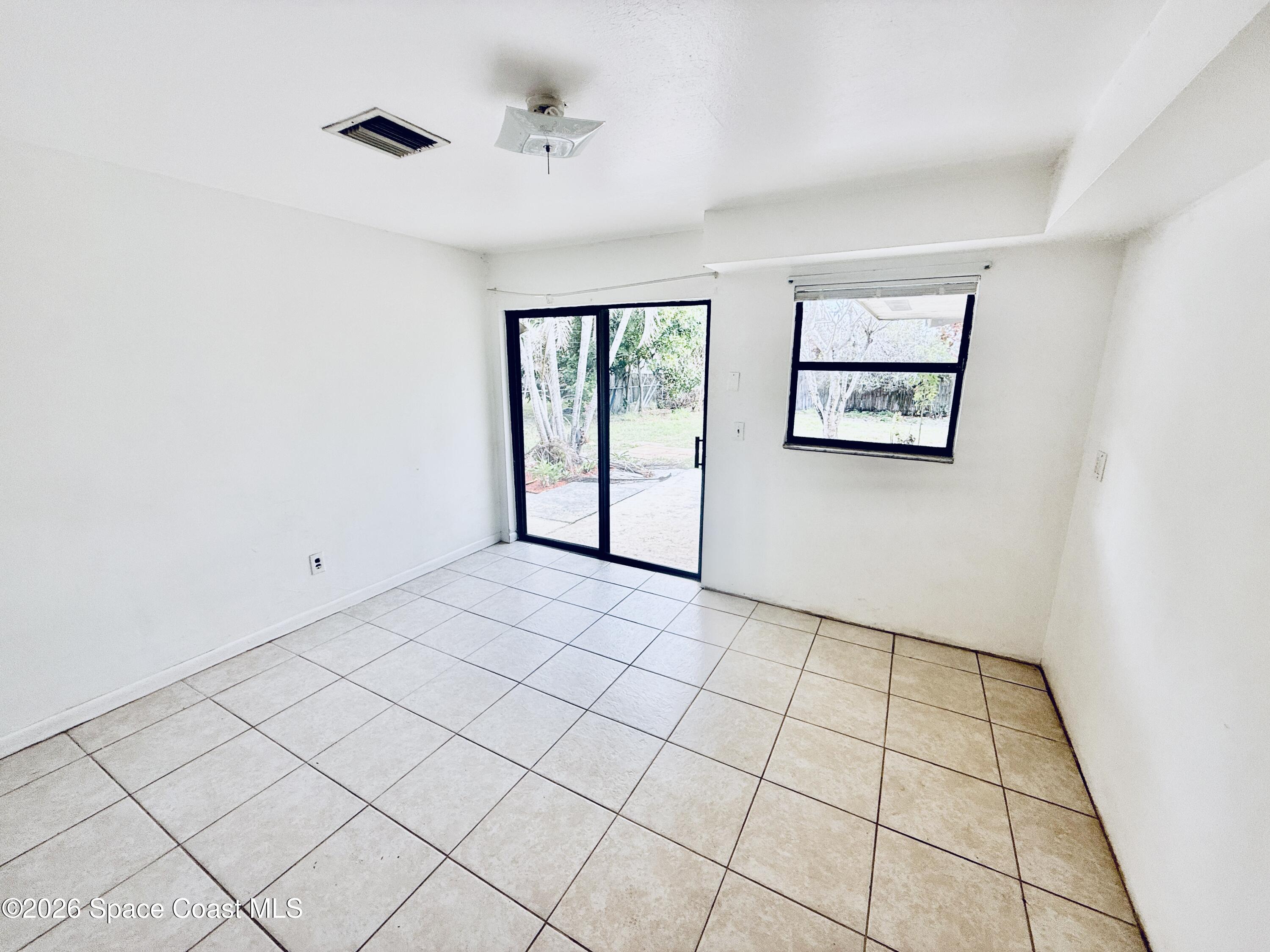 410 South Tropical Trail Merritt Island, FL 32952 - Photo 14 of 28 20260309_161436999_iOS