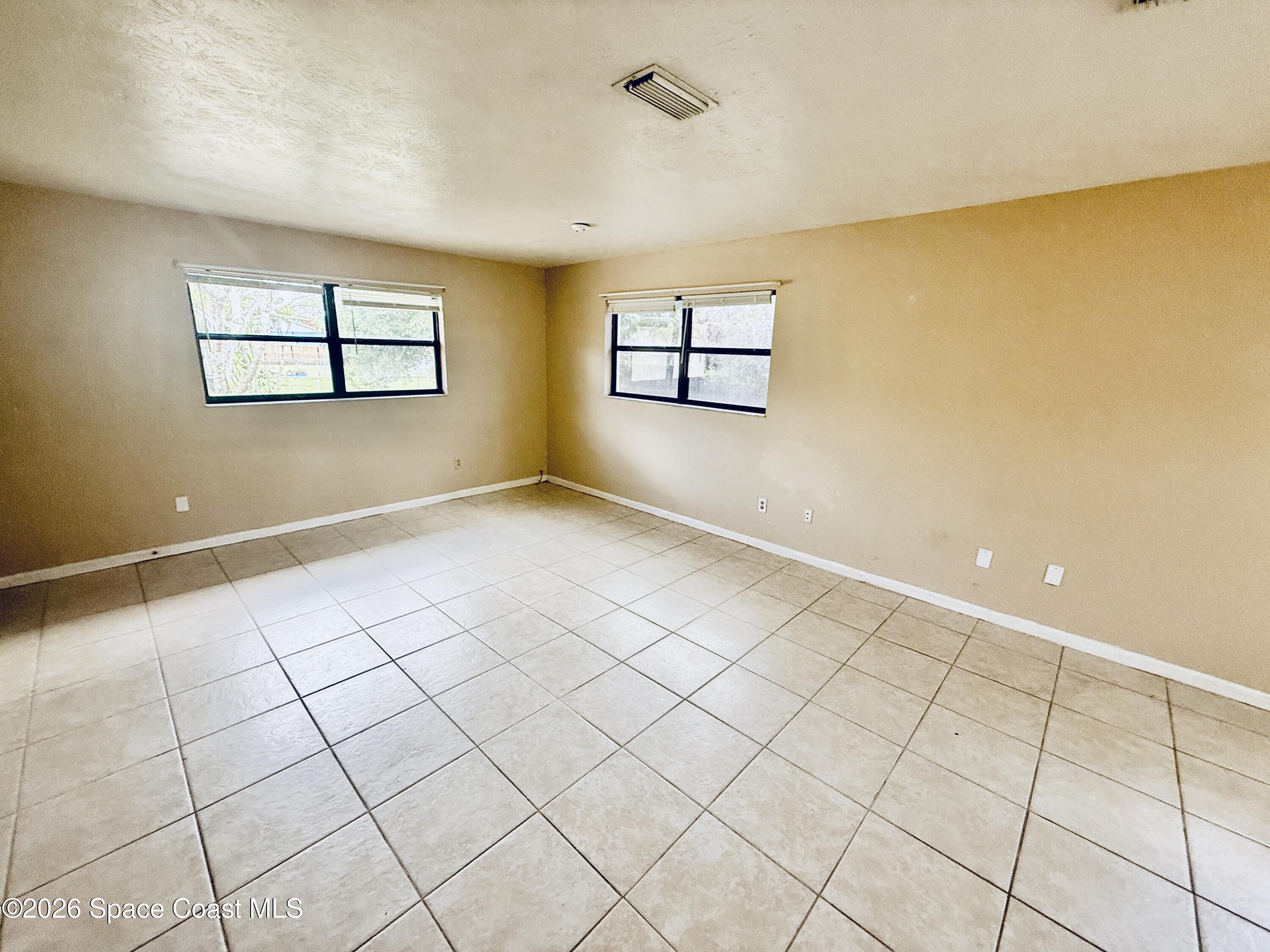 410 South Tropical Trail Merritt Island, FL 32952 - Photo 23 of 28 20260309_161738203_iOS
